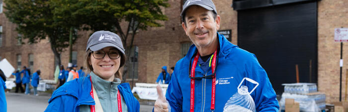 Volunteers at an aid station at the 2024 Bank of America Chicago Marathon