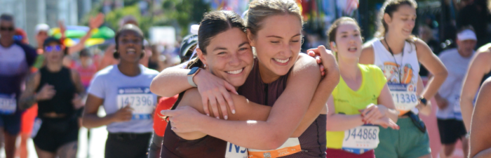 Participants embracing after the 2025 Bank of America Chicago Marathon